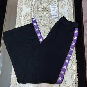 Souhait black wide leg pants with shimmery purple side stripes